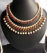 Buy two Maroon Pearl Gota Necklace Set