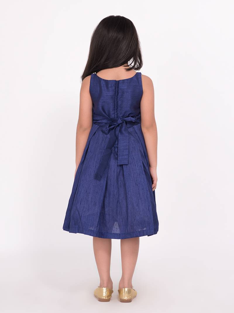 Pleated Dress With Floral Detail