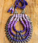 Purple thread wrapped beads necklace