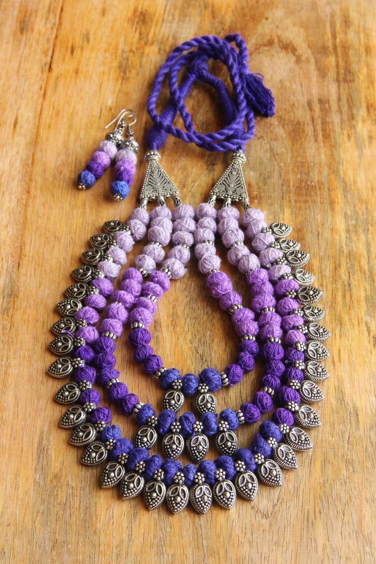 Purple thread wrapped beads necklace