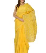 Yellow embroidered georgette saree with blouse