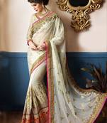 White embroidered pure georgette saree with blouse