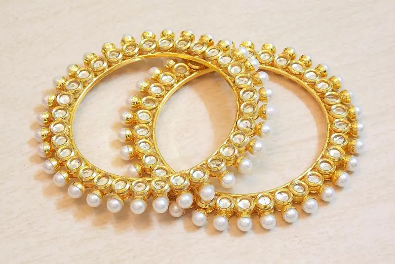 Gold Pearl bangles-and-bracelets