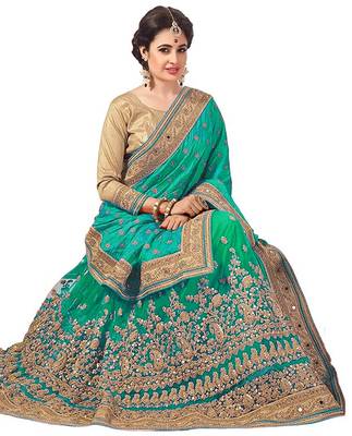 Green embroidered silk & net saree with blouse 3