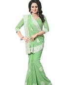 Light green embroidered georgette saree with blouse