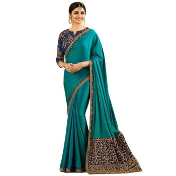 Turquoise embroidered silk saree with blouse 1