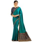 Turquoise embroidered silk saree with blouse