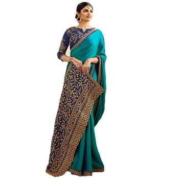 Turquoise embroidered silk saree with blouse 4