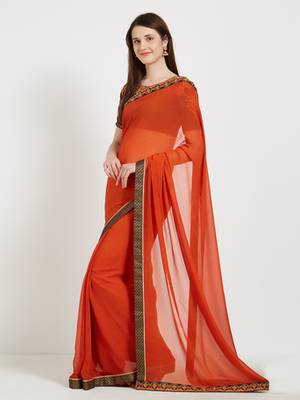 Orange color georgette saree with blouse 2