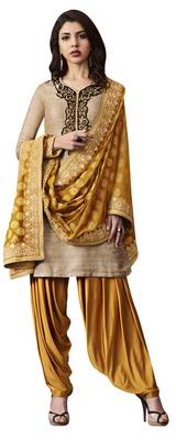 Beige coloured Raw Silk semi stitched ethnic suits 1