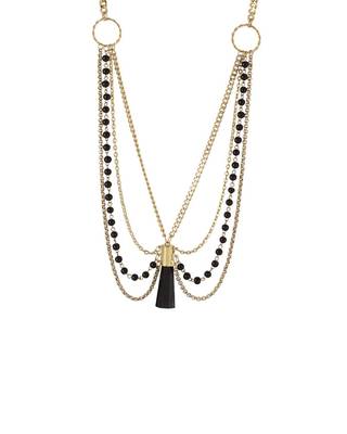 layered beaded necklace in gold tone with central drop of edgy black stone 1