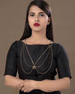 layered beaded necklace in gold tone with central drop of edgy black stone 3