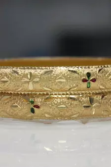 Set Of 2 Gold Dyed Bracelets With Etching Design