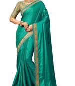 Green embroidered silk saree with blouse