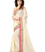 Beige embroidered georgette saree with blouse