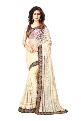 Beige embroidered net saree with blouse 1