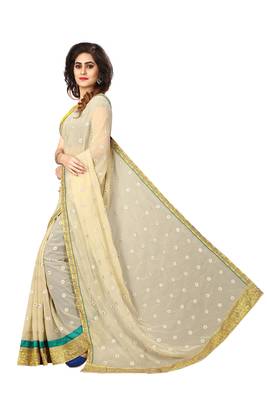 Beige embroidered georgette saree with blouse 2