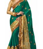 Green embroidered satin saree with blouse