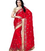 Red embroidered satin saree with blouse