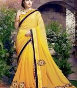 Light yellow embroidered georgette saree with blouse