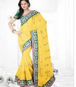 Light yellow embroidered georgette saree with blouse