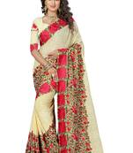 Beige embroidered georgette saree with blouse