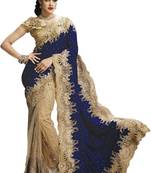 Blue with golden embroidered velvet saree with blouse