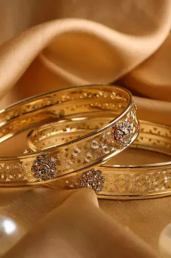 Beautiful Pair Of Golden Stone Bracelets With Intricate Jaaliwork