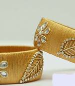 Beige bangles-and-bracelets