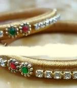Beige bangles-and-bracelets