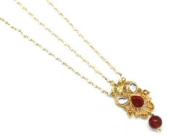 Golden Textured Maang Tikka And Matha Patti Decorated With Kundan And Crystal 3