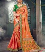 Orange woven silk blend saree with blouse