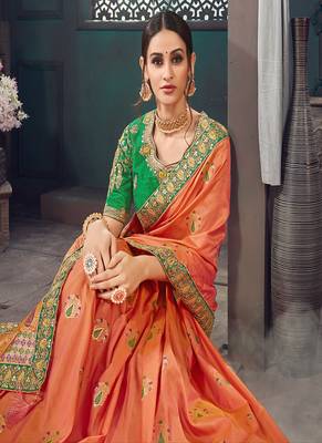 Orange woven silk blend saree with blouse 2