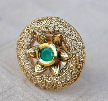 Intricately Designed Cocktail Finger Ring Studded with Emerald 1