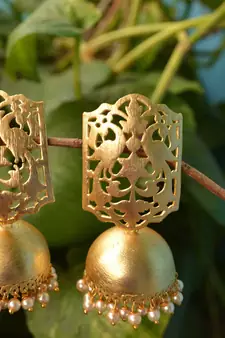 Designer Gold plated high gloss golden Filigree or Jali work jhumka with pearl in bottom