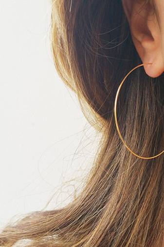 Designer Golden Bold look 2.3 inch diametre Hoop Earrings