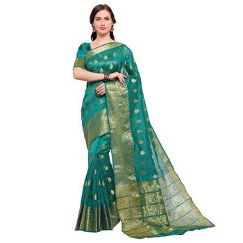 Turquoise woven silk blend saree with blouse 1