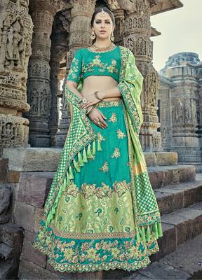 Teal embroidered silk semi stitched lehenga 1