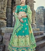 Teal embroidered silk semi stitched lehenga