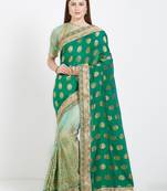 Green color lycra and silk saree with blouse
