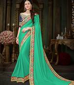 Manohari Turquoise Embroidered Georgette Saree with Blouse 
