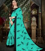 Manohari Turquoise Embroidered Georgette Saree with Blouse 