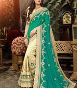 Teal embroidered art silk blend saree with blouse