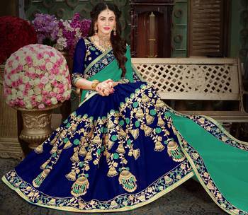 Teal embroidered georgette saree with blouse 2
