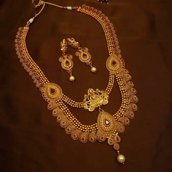 Laxmi ruby green brass temple south indian long haram necklace earring jewellery set for wedding festival  1