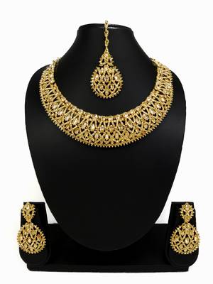 Designer golden ad zircon necklace set with maang tikka 1