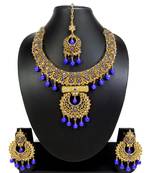 Gorgeous blue and gold austrian diamond necklace set with maang tikka