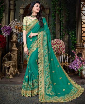 Sea green embroidered georgette saree with blouse 1