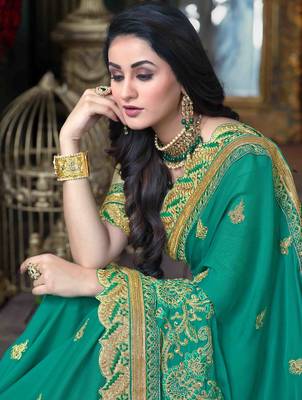 Sea green embroidered georgette saree with blouse 2