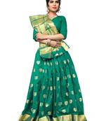 Green woven banarasi saree with blouse
